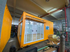 Container bureau mobile 20 pieds x 8, couleur jaune, bien vitré avec installation électrique et chauffage